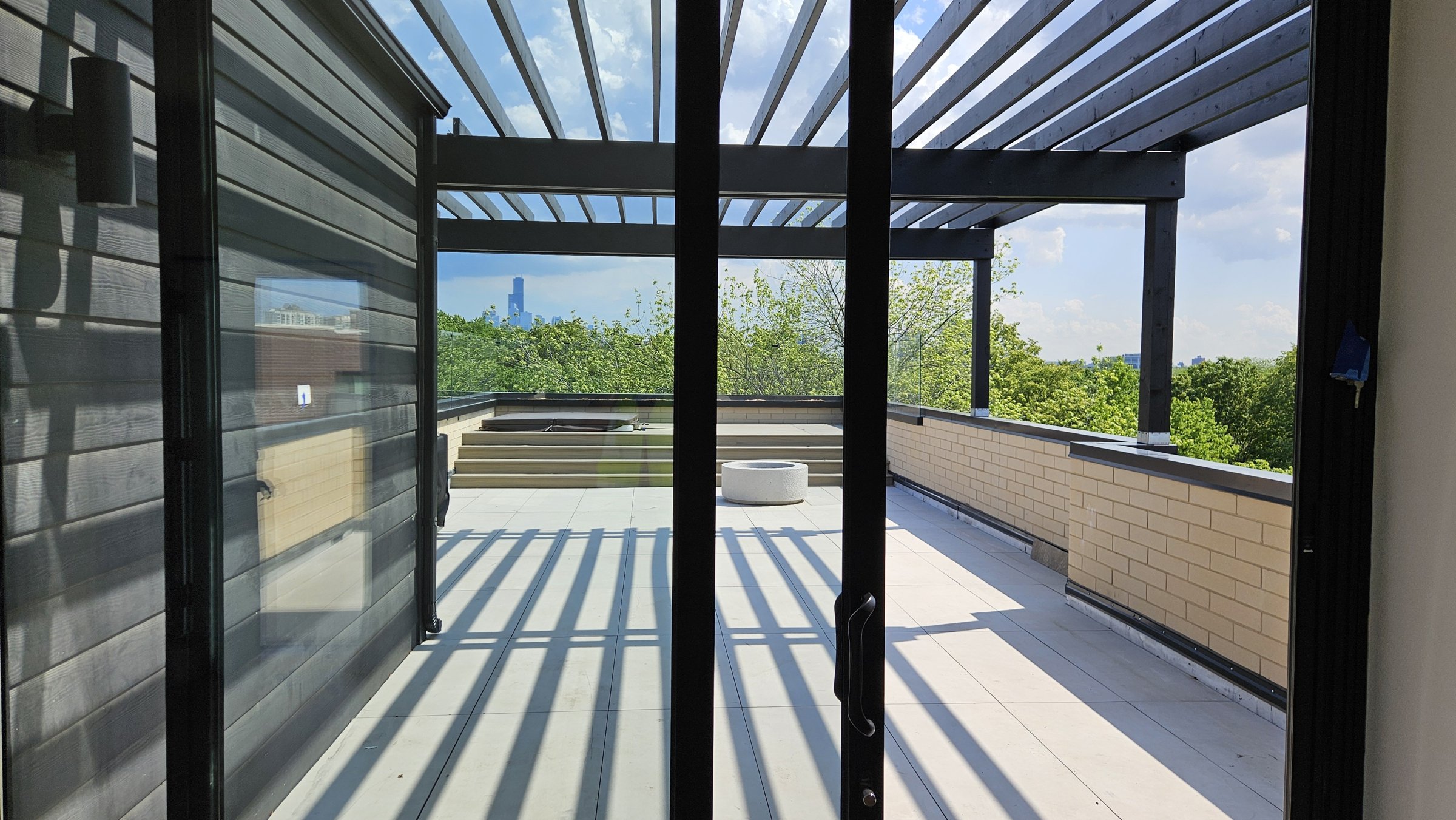 Roof deck pavers seen from the slider