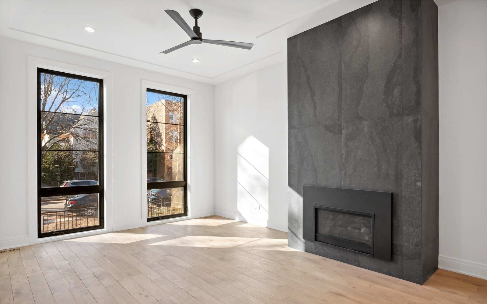 Large-format tile surround, floor to ceiling